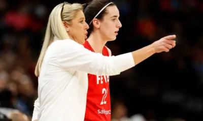Christie Sides coaching courtside during a WNBA game